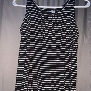 Black and white stripped off the shoulder